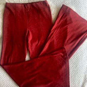 Dark red flare stretch pants with front slit